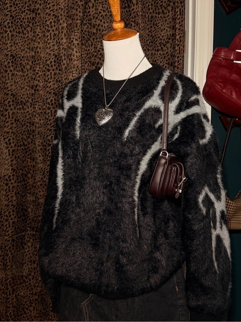 Black Fuzzy Sweater with White Abstract Flame Accents